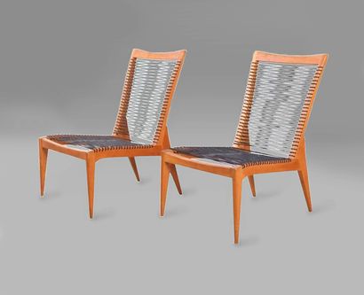 Louis SOGNOT (1892-1969) 
Pair of oak armchairs with green Sadroplast threads on...