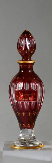 CHRISTIAN DIOR - «Diorama» - (1949) Amphora bottle on a star-shaped pedestal in colorless...