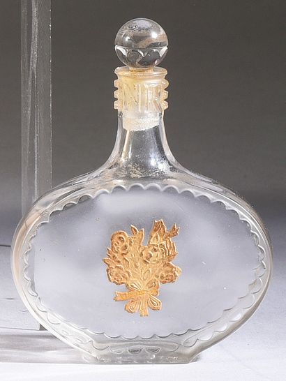 Nina Ricci - «Cœur Joie» - (1946) 
Colorless glass "swan neck" bottle, rectangular...