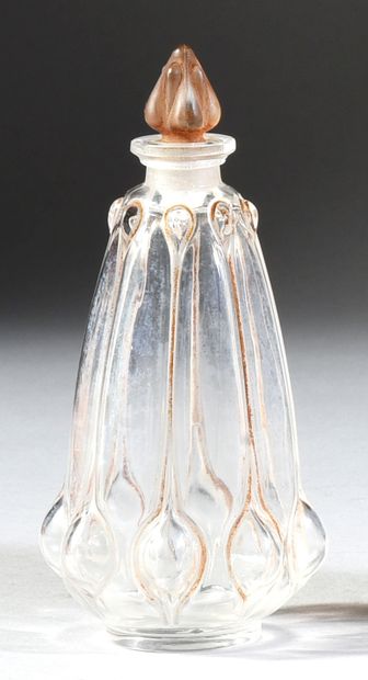 René Lalique & Cie - «Olives» - (1912) 
Colorless glass bottle pressed cylindrical...