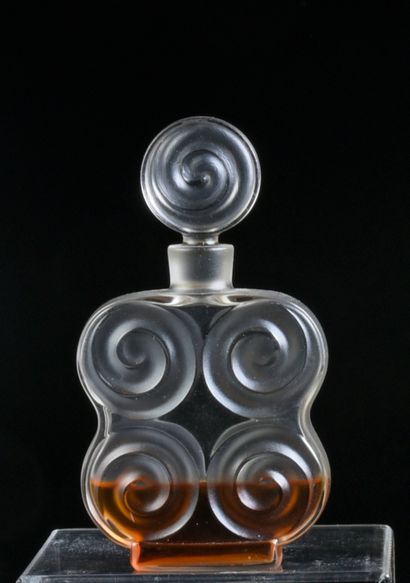 Lancôme - édition de 1942 - Pressed colourless glass bottle of cubic rectangular...