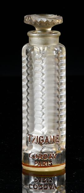 Corday - «Tzigane» - (années 1930) Colorless glass bottle pressed cylindrical section,...