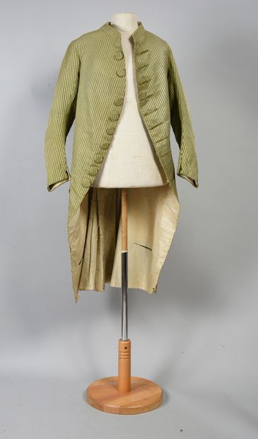 null . Dress suit, circa 1785-1790, pekin straight-collared suit with green shaded...