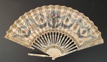 null Two fans, circa 1880-1900

One, the leaf in cream silk painted with roses and...