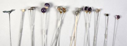 null . Nice set of hatpins circa 1900, ends decorated with translucent and colored...