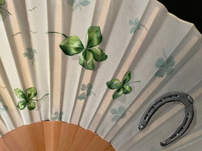 null Lucky charm, circa 1880

Folded fan, the cream silk leaf painted with four-leaf...