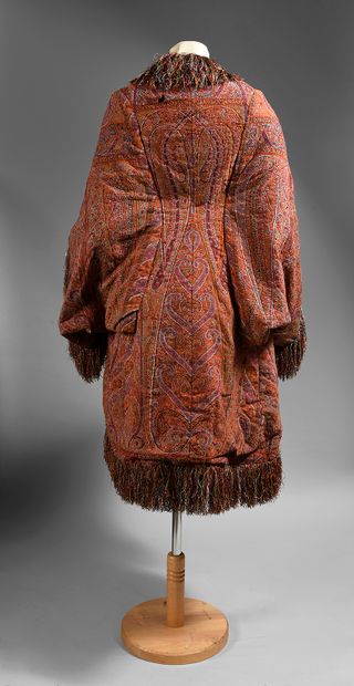 null . Visit in an Indian cashmere shawl, circa 1870, bat-sleeved visit in a bright...