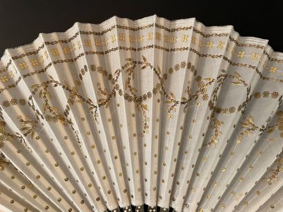 null Golden laurels, circa 1910

Folded fan, the cream silk leaf embroidered with...