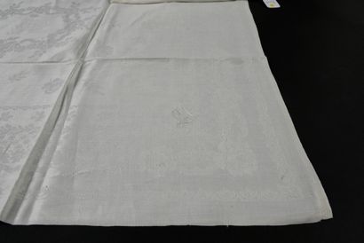 null . Suite of twelve linen damask napkins, circa 1900, rose wreath on the center...