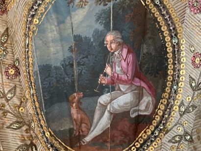  Le petit marchand d’oublies, vers 1780-1790 
Éventail plié, la feuille en soie peinte...