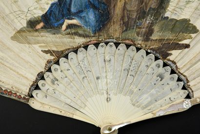 null The shepherdess, circa 1700 Folded fan, the leaf in skin, mounted in English,...