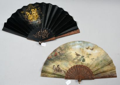 null Two fans, circa 1890

One, the black satin leaf decorated with yellow roses....