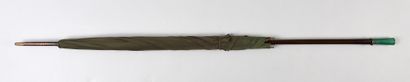 null . Umbrella, early 20th century, the mast in rosewood with a green glass pommel...