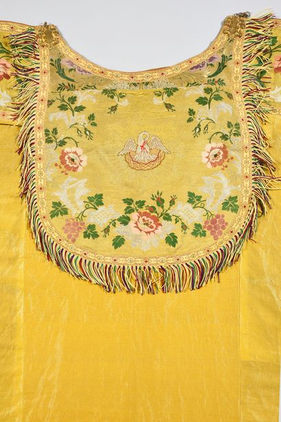 null . Cloak in gold cloth, early 20th century, orphreys with garlands of roses and...