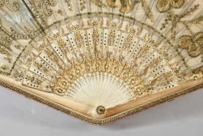null Clovers, circa 1900

Folded fan, the tulle leaf decorated with embroidered shamrocks,...