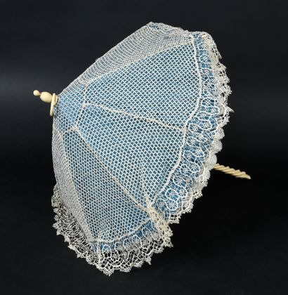 null . Marquise umbrella, circa 1880, the handle carved with a twisted branch in...