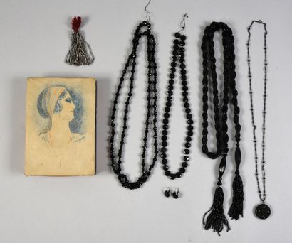 null . Set of four black glass bead necklaces and long necklaces, circa 1920, small...