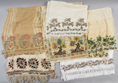 . Set of thirteen embroidered belts or scarves,...