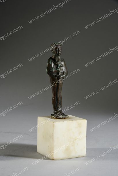 null STATUETTE OF PTAH. 
 Bronze with dark green patina, mounted later on a square...