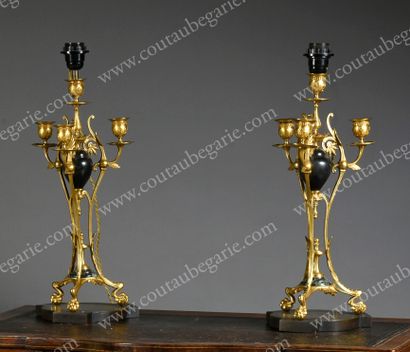 null Pair of candlesticks.
In gilt bronze, with four lights, electrically mounted,...