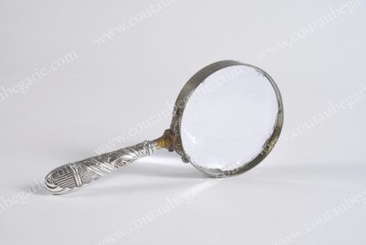 null DESK MAGNIFIER. 
 Round shape, silver handle, with arabesque decoration and...