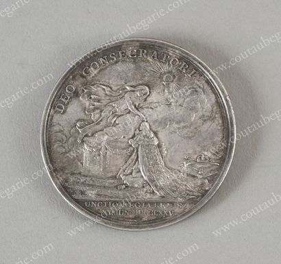 null SACRED OF KING LOUIS XVI.
Commemorative silver medal, signed B. Duvivier (1730-1819)...