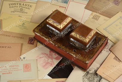 null DOUBLE DESK INKWELLS. 
 Presented in an old binding, containing a square glass...