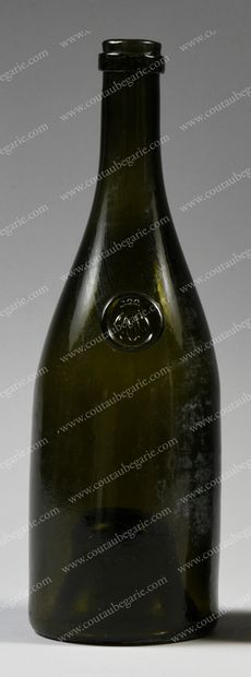 null * WINE BOTTLE FROM THE CAVES
OF CHANTILLY CASTLE.
In blown glass, marked with...