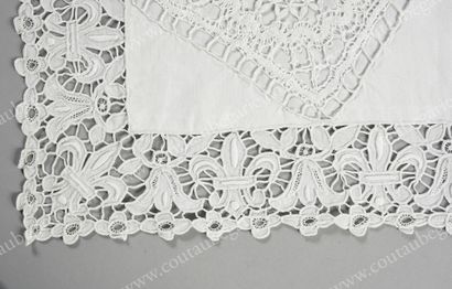 null * Pair of pillowcases.
Square shape, in white linen, bordered with a large lace...