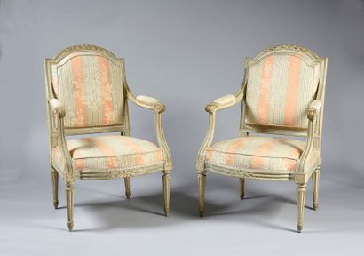 Pair of armchairs in moulded wood and carved...