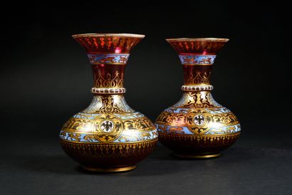 Fritz Heckert Petersdorf (1837-1887) 
A pair of ruby glass bottle vases with richly...