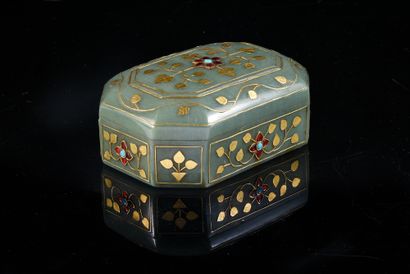 Indian octagonal covered box carved in green...