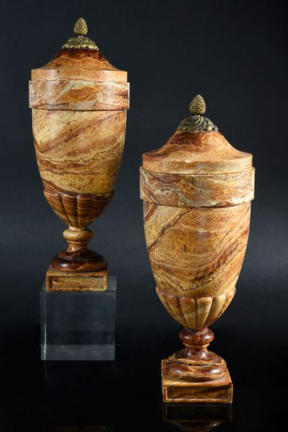 A pair of oriental alabaster covered vases...