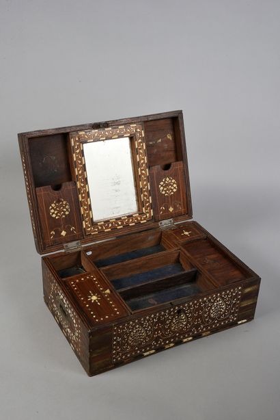 null An 18th century Indian box, quadrangular in shape, made of wood inlaid with...