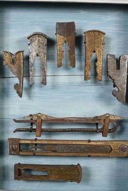 null Set of wrought iron, engraved, openwork and gilded sword and dagger fittings.
Tibet...