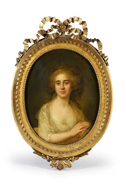 DANS LE GOÛT D'ANTOINE VESTIER Portrait of a young woman in bust.
Oval canvas
69...