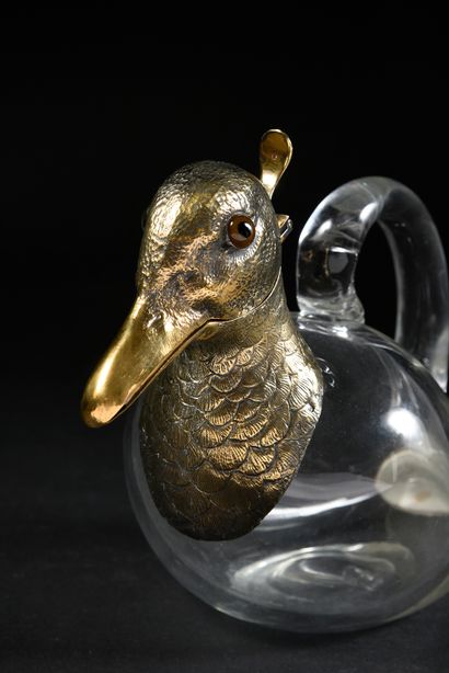 null Duck pourer in blown crystal, the head and tail in 925th vermeil finely regraved;...