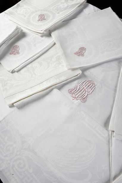 null Parts of table services in linen damask with the elegant monogram MBS underlined...
