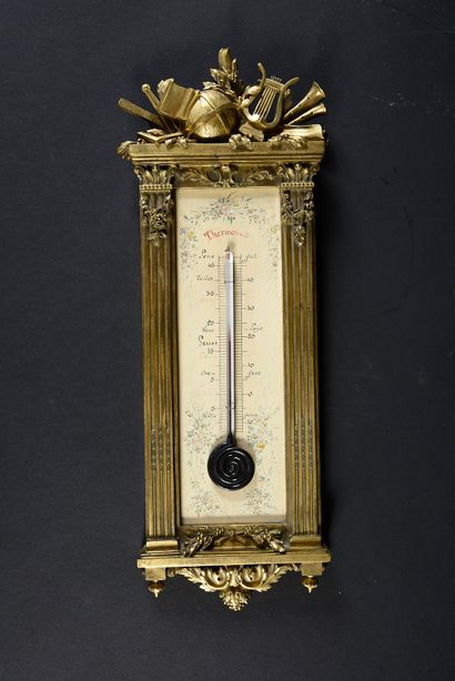 null Thermometer in chased and gilt bronze, the uprights in fluted pilasters, the...