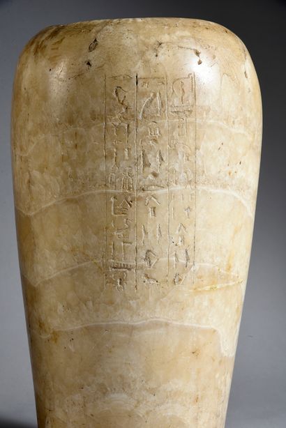 null Api canopic vase inscribed on three columns with the name of Ptahmes III, pontiff...