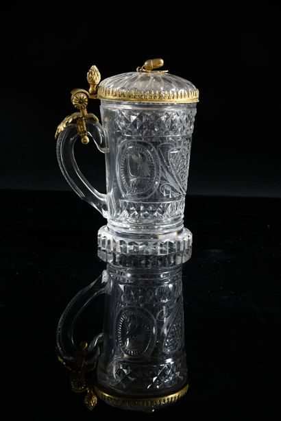 null A cut and engraved crystal covered goblet, decorated with two friezes of diamond...