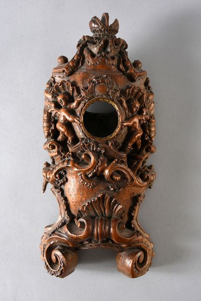 Carved linden wood watch case decorated with...