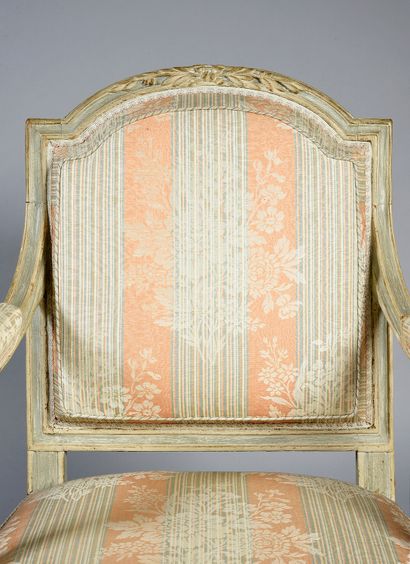 null Pair of armchairs in moulded wood and carved with flowers, the flat back with...