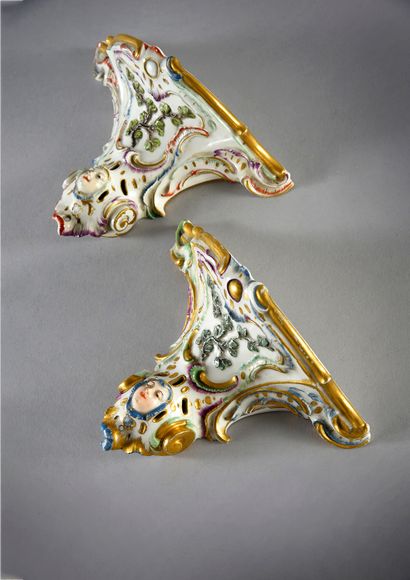  Two small 18th century Nymphenburg porcelain wall brackets Hollow marks on the coat...