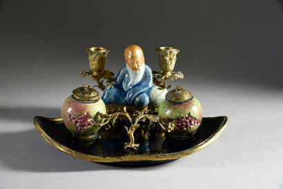 null Porcelain and gilt bronze writing desk, the tray with contours in Chinese porcelain...