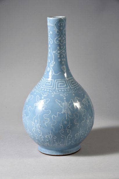 A Chinese pale blue moonlight porcelain bottle-shaped...