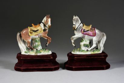  Two 18th century Meissen porcelain horses, the later decoration After J.-J. Kändler,...