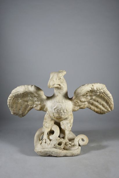 Eagle in sculpted marble. The eagle with...