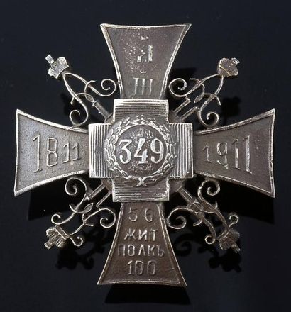 null Badge du 56ème régiment d'infanterie de Jitomir, en métal, avec sa molette d'origine....