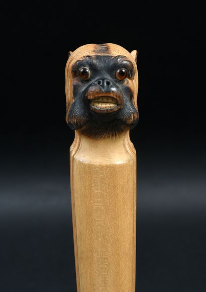 null Dog, circa 1880,Original wooden broken type fan. The top of the strands carved...